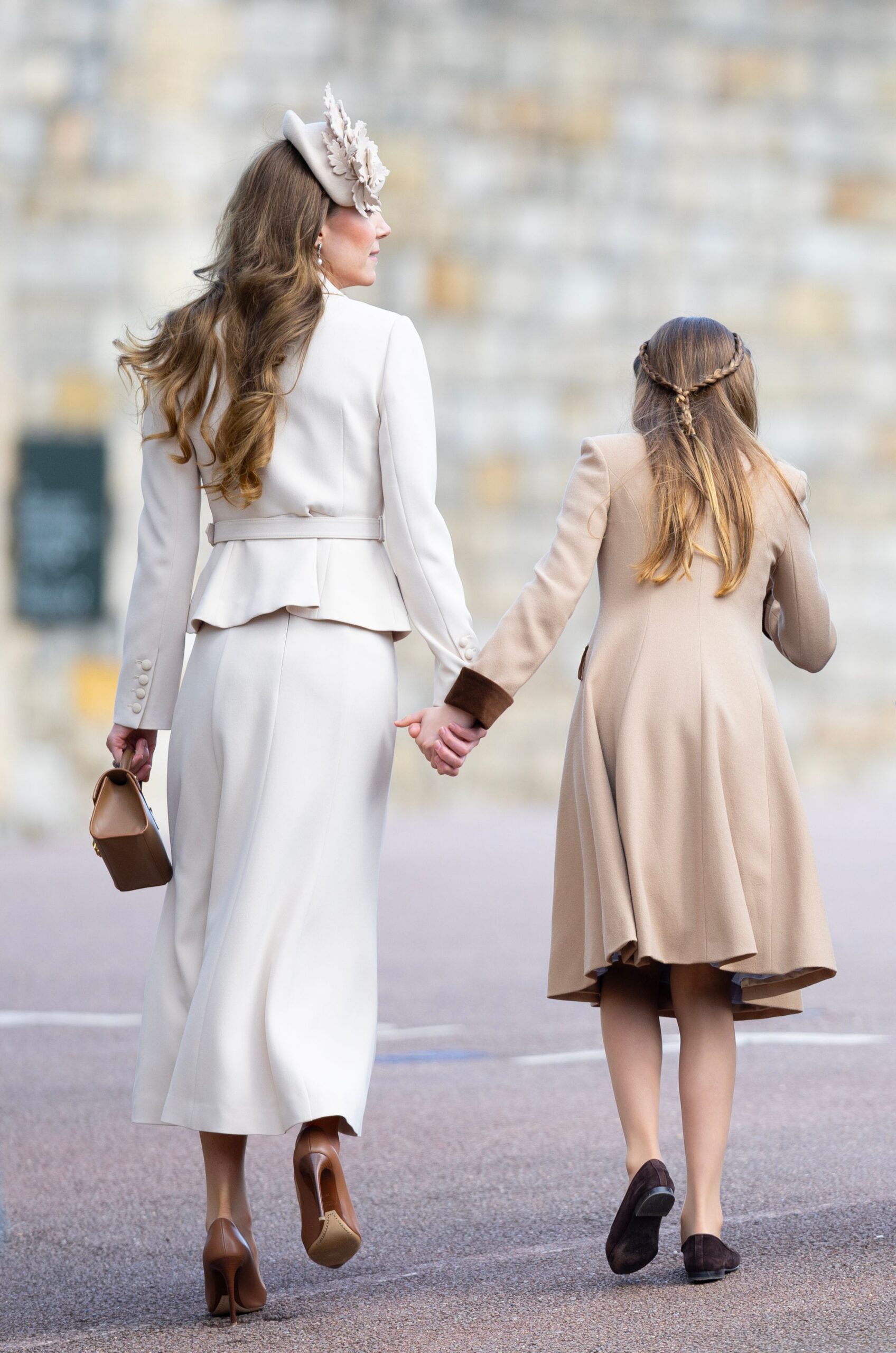 Kate Middleton holding Princess Charlotte's hand at Easter service