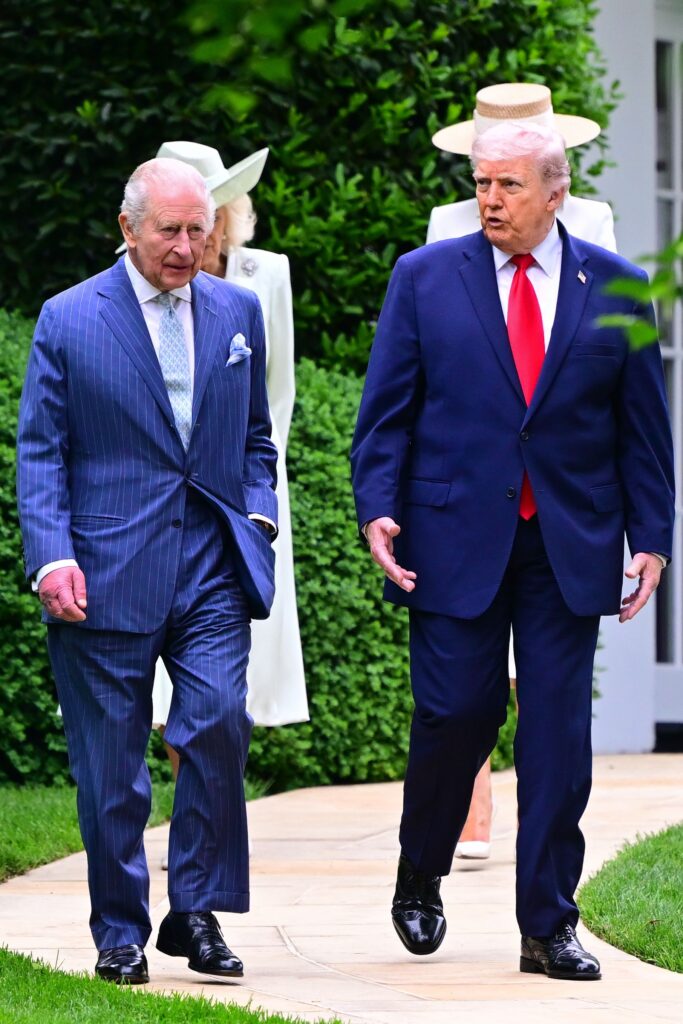 King Charles and Donald Trump walking
