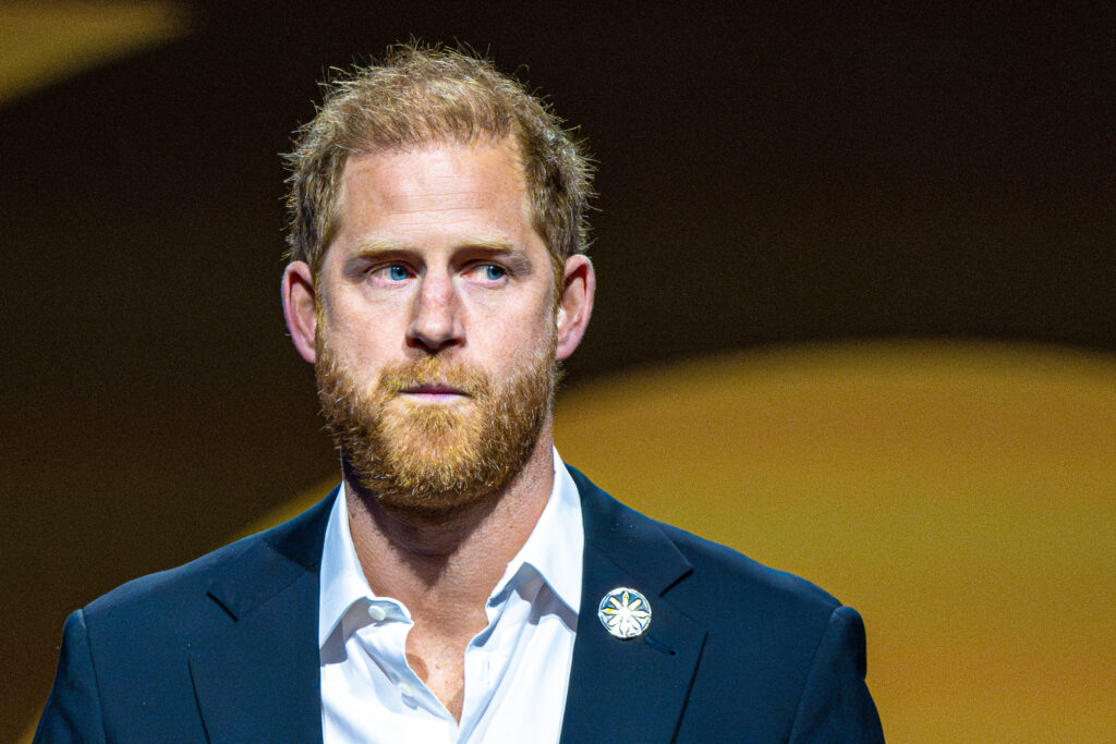 Prince Harry frowning