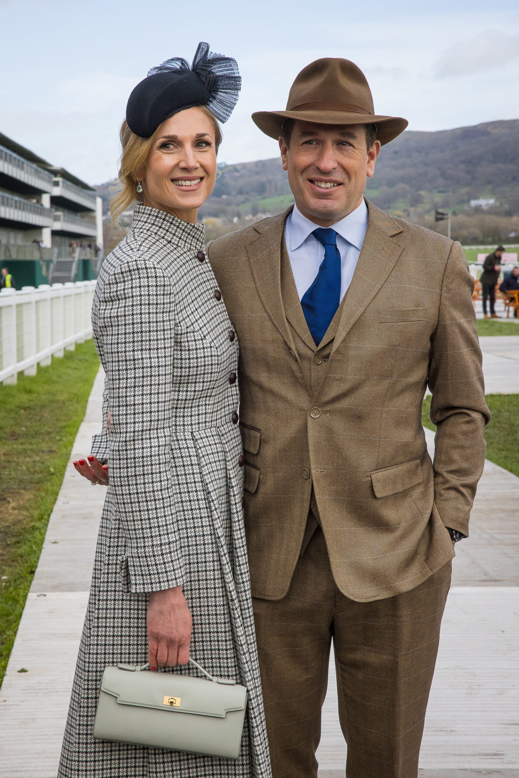 Peter Phillips smiling with Harriet Sperling at races