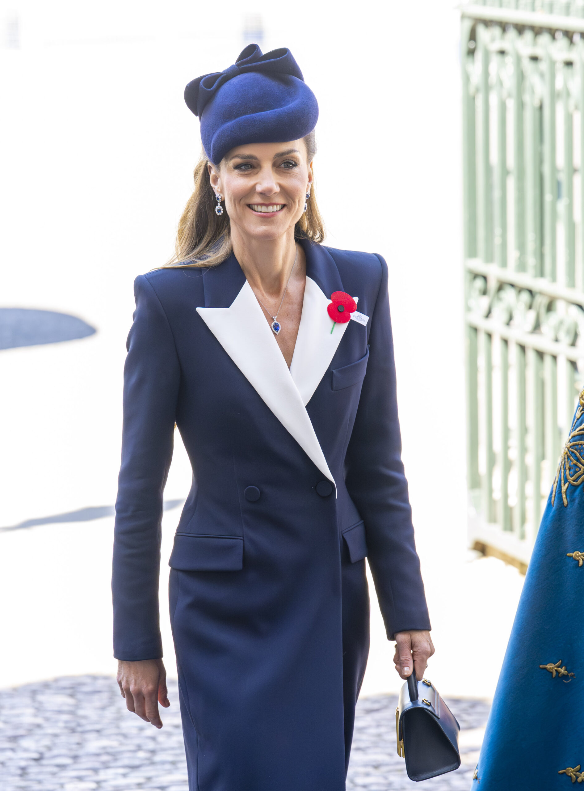 Kate Middleton walking and smiling 