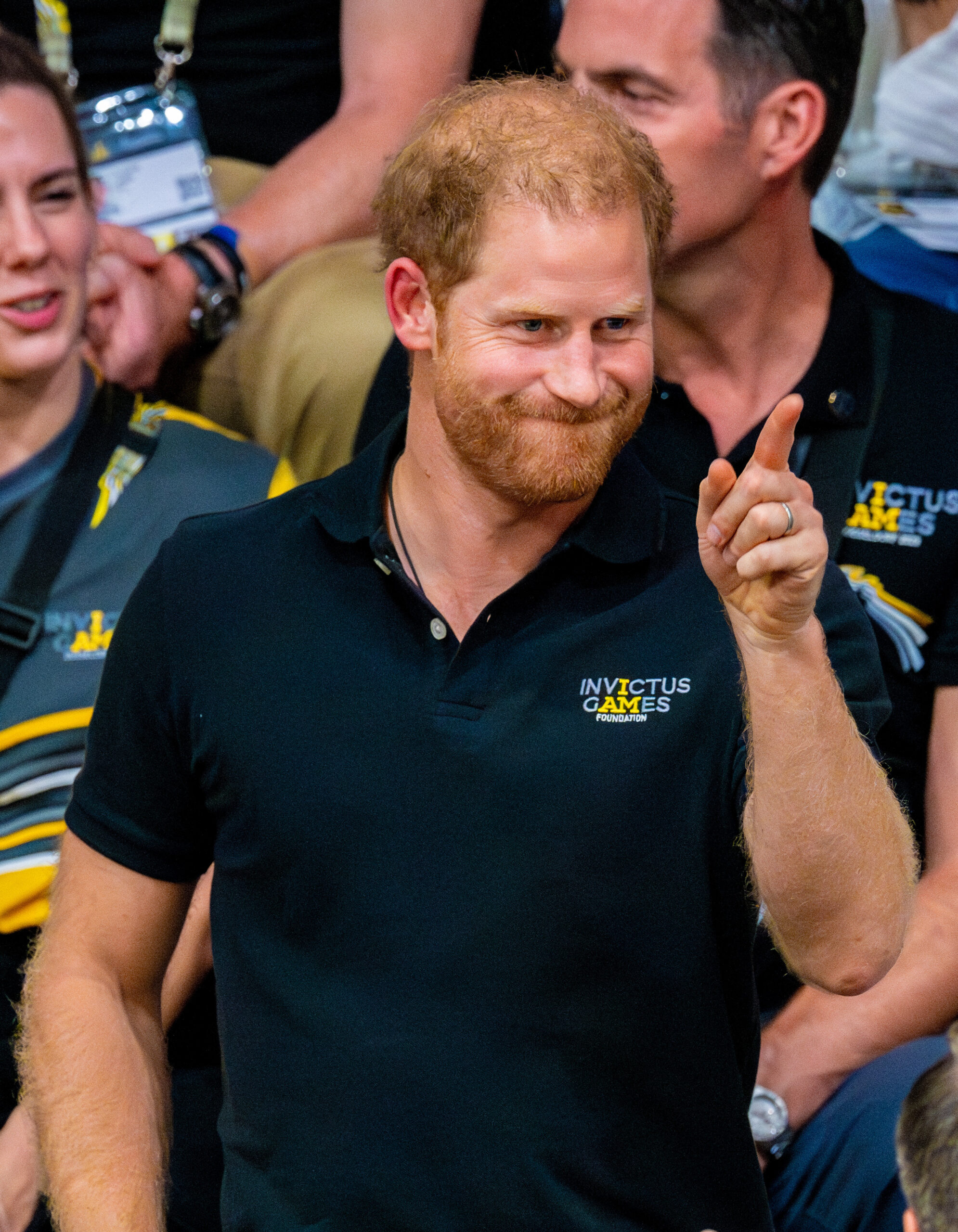 Prince Harry pointing and frowning