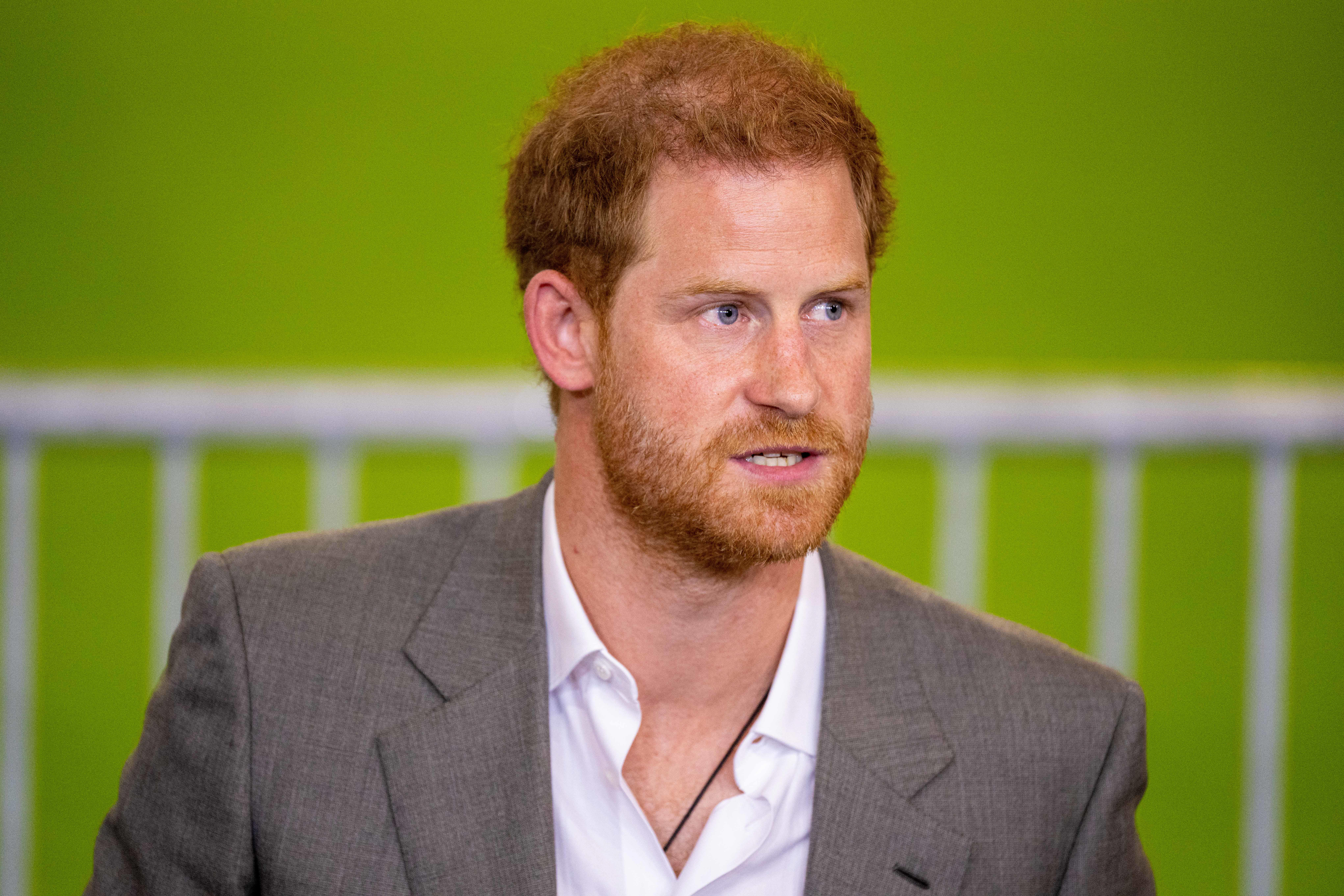 Prince Harry frowning