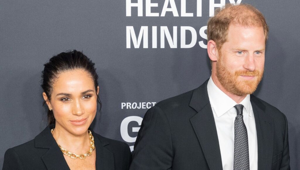 Meghan Markle and Prince Harry smiling at New York event