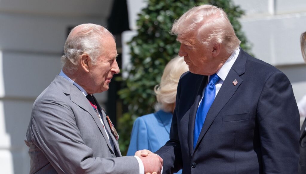 King Charles shaking hands with Donald Trump