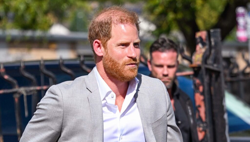 Prince Harry wearing grey blazer in the UK
