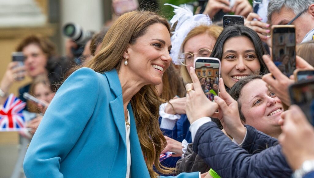 Kate Middleton posing for selfies with people in Italy