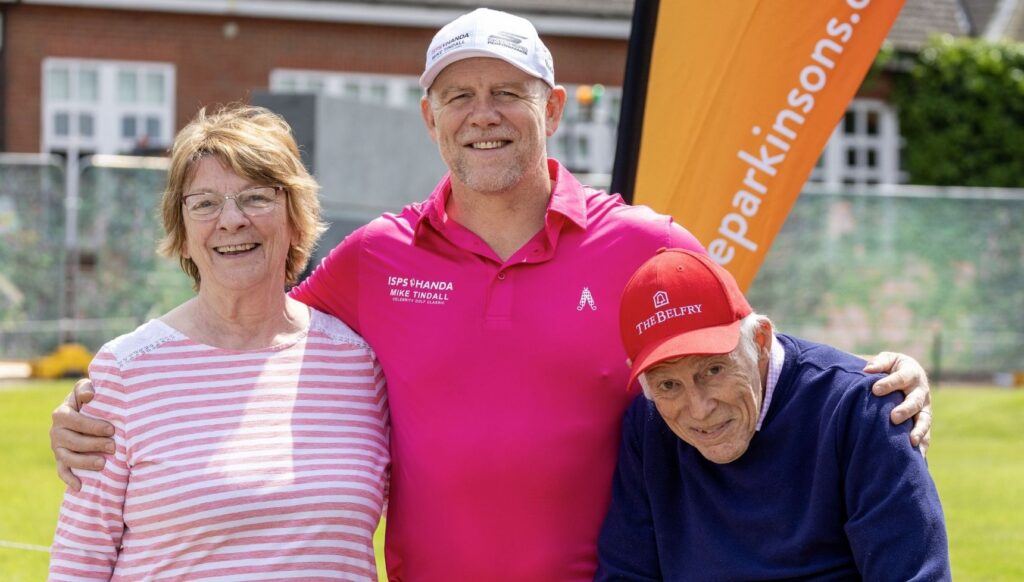 Mike Tindall smiling with his parents