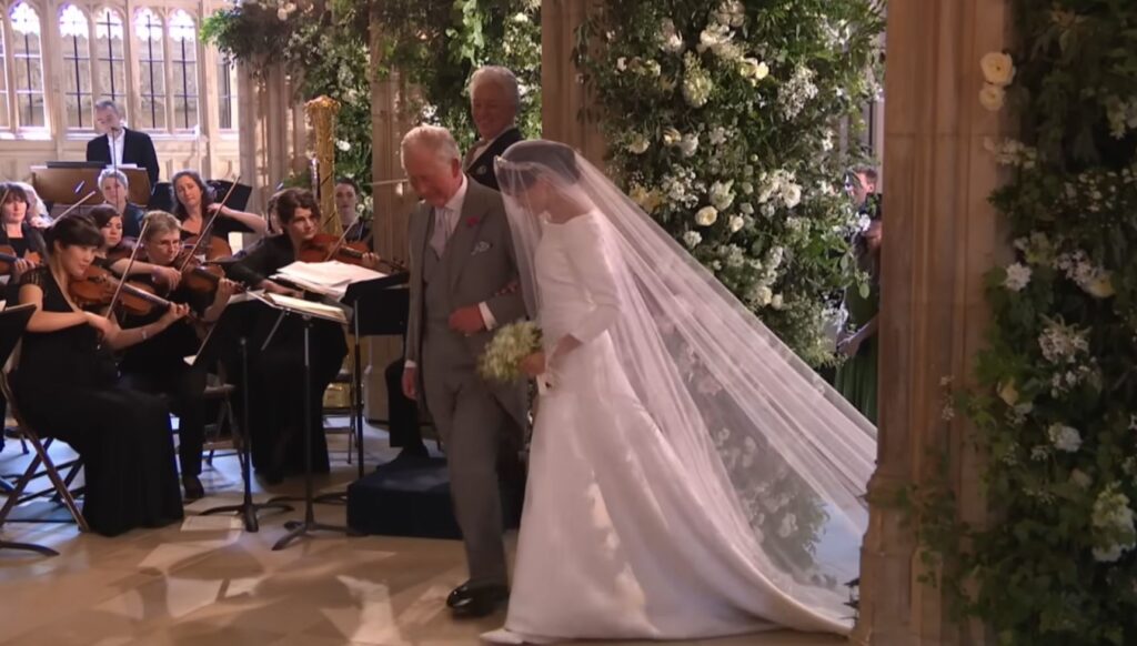 King Charles walking Meghan Markle down the aisle on wedding day