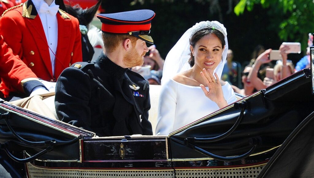 Prince Harry and Meghan Markle in carriage on their wedding day