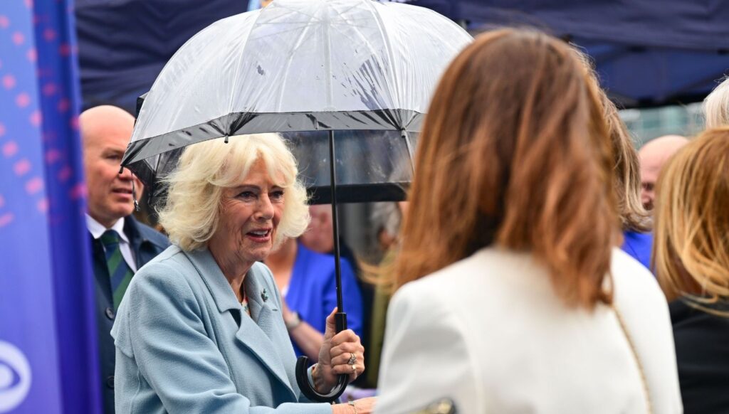 Queen Camilla holding umbrella in Northern Ireland