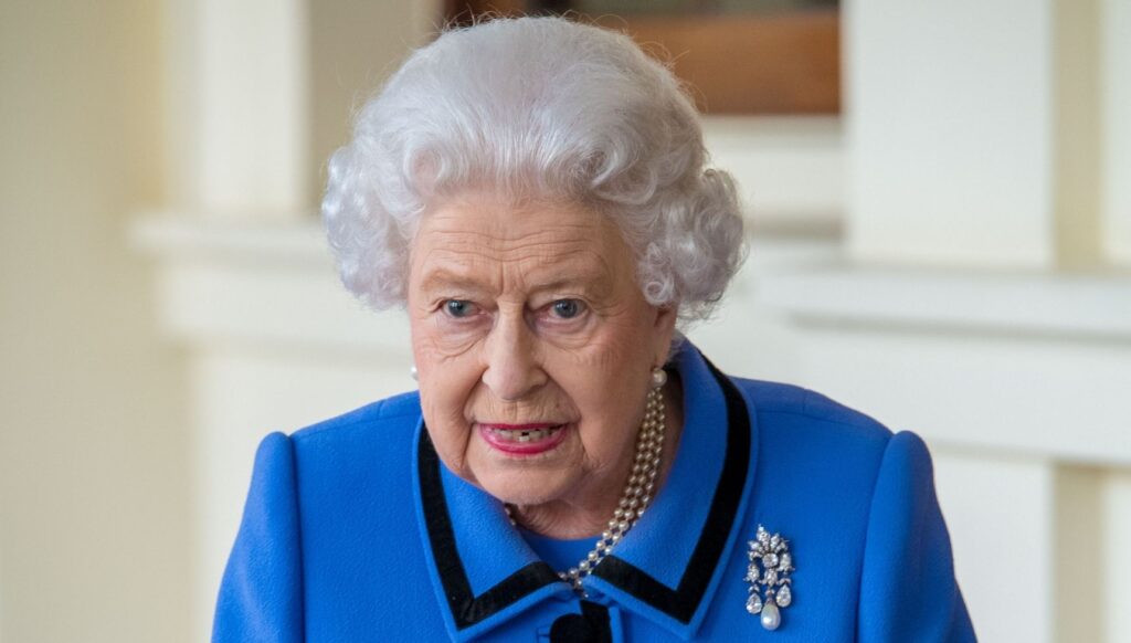 Queen Elizabeth II in blue outfit