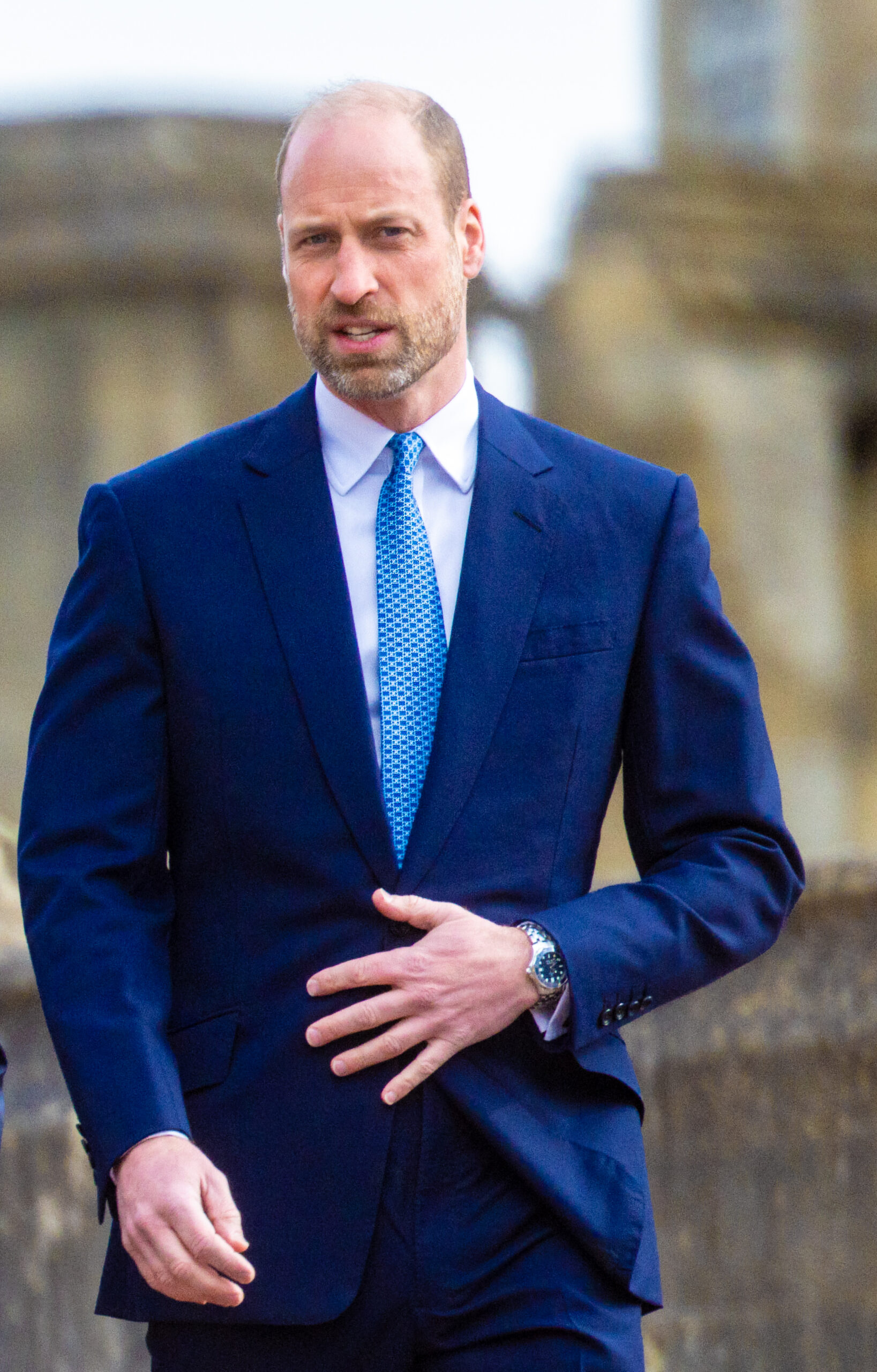 Prince William walking in suit