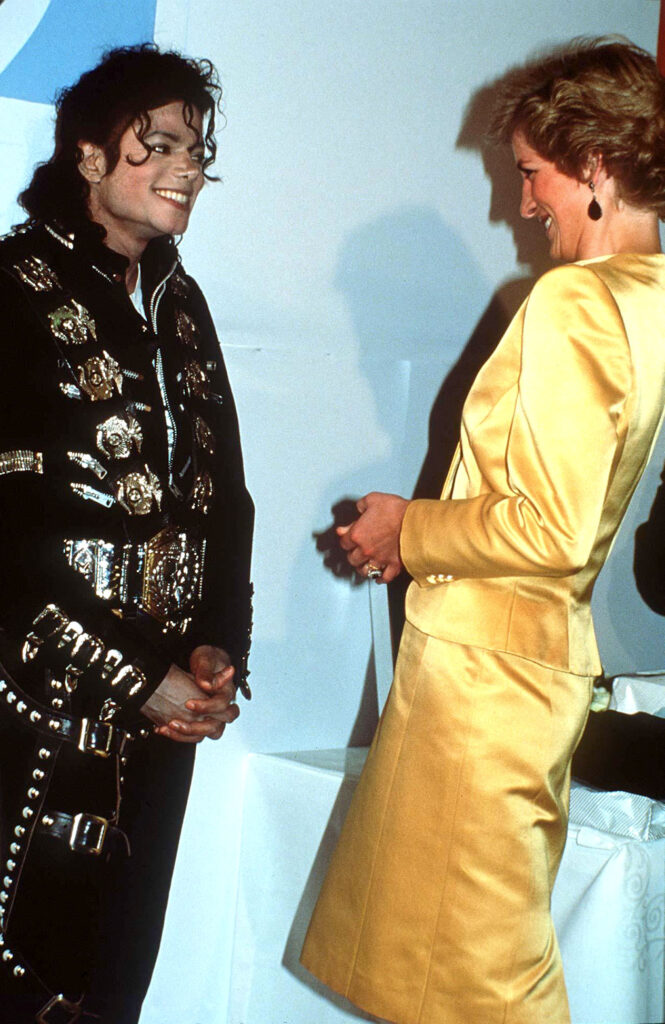 Michael Jackson and Princess Diana facing each other and smiling